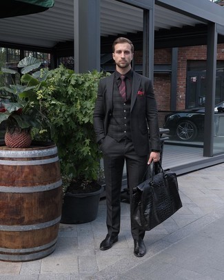 Black Leather Tote Bag Outfits For Men: Go for a black suit and a black leather tote bag for comfort dressing with a twist. Take a classier approach with shoes and add a pair of black leather oxford shoes to the mix.