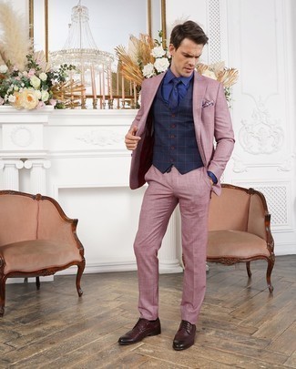 Burgundy Leather Brogues Outfits: For a look that's absolutely GQ-worthy, go for a pink suit and a navy check waistcoat. To infuse a carefree vibe into this look, complete this outfit with a pair of burgundy leather brogues.