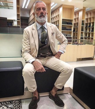 Brown Waistcoat Outfits: This combo of a brown waistcoat and a beige suit is ideal when you need to look classy and really sharp. Take an otherwise mostly classic outfit in a more laid-back direction by rounding off with a pair of dark brown suede loafers.