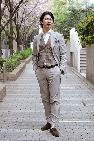 Tobacco Waistcoat Outfits: This combo of a tobacco waistcoat and a grey suit can only be described as ridiculously sharp and elegant. To give your getup a more casual twist, add a pair of dark brown suede loafers to the equation.