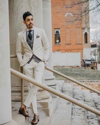 White Dress Shirt Outfits For Men: This is undeniable proof that a white dress shirt and a beige suit are amazing together in an elegant look for a modern man. You could take a more casual route on the shoe front by finishing with dark brown leather double monks.