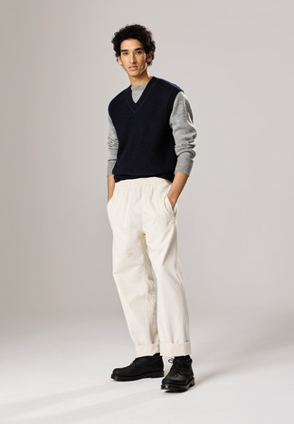 Black Leather Desert Boots Outfits: If you enjoy comfort dressing, rock a grey crew-neck sweater with white chinos. Go for black leather desert boots and ta-da: the ensemble is complete.