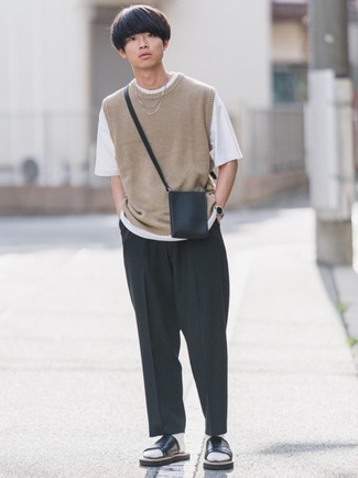 Messenger Bag Outfits: We're all seeking practicality when it comes to style, and this casual street style combination of a tan sweater vest and a messenger bag is a perfect example of that. Black leather sandals will give a sense of stylish effortlessness to an otherwise classic getup.