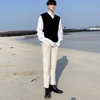 White Long Sleeve Shirt Outfits For Men: A white long sleeve shirt and white chinos will introduce extra style into your current casual routine. A pair of black leather derby shoes effortlessly steps up the wow factor of your outfit.