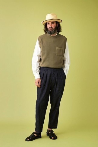 Olive Sweater Vest Outfits For Men: An olive sweater vest and navy linen chinos worn together are a nice match. Clueless about how to finish? Make black leather sandals your footwear choice to switch things up.