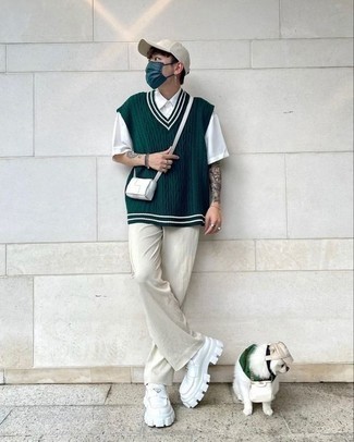Beige Baseball Cap Outfits For Men: For a casually cool ensemble, try teaming a dark green sweater vest with a beige baseball cap — these pieces go really cool together. And if you wish to effortlessly up this look with shoes, why not choose a pair of white leather loafers?