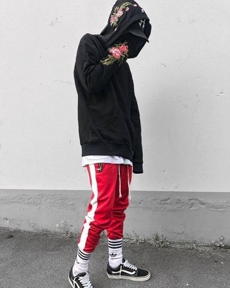 Men's Black and White Canvas Low Top Sneakers, Red and White Vertical Striped Sweatpants, White Crew-neck T-shirt, Black Floral Hoodie