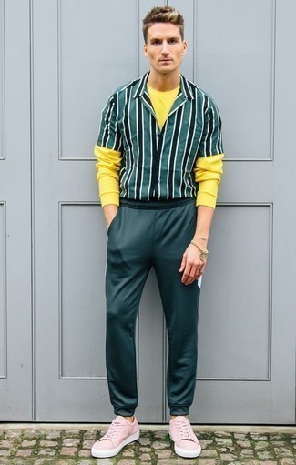 Men's Pink Canvas Low Top Sneakers, Dark Green Sweatpants, Yellow Long Sleeve T-Shirt, Dark Green Vertical Striped Short Sleeve Shirt