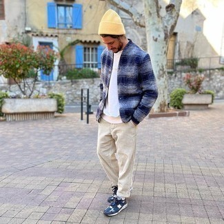 Navy Plaid Cardigan Outfits For Men: In situations comfort is everything, try teaming a navy plaid cardigan with beige corduroy chinos. Go ahead and add navy and white athletic shoes to your ensemble for a touch of stylish nonchalance.