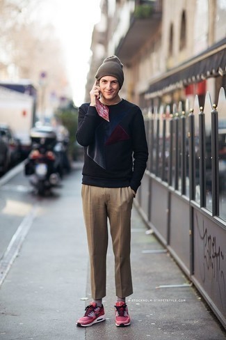 Navy Sweatshirt Outfits For Men: This combo of a navy sweatshirt and khaki chinos is hard proof that a safe off-duty look doesn't have to be boring. Hot pink athletic shoes will add an easy-going vibe to this look.