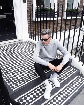 Black Sunglasses Outfits For Men: When the situation permits casual urban dressing, wear a grey sweatshirt and black sunglasses. As for shoes, introduce a pair of white athletic shoes to the equation.