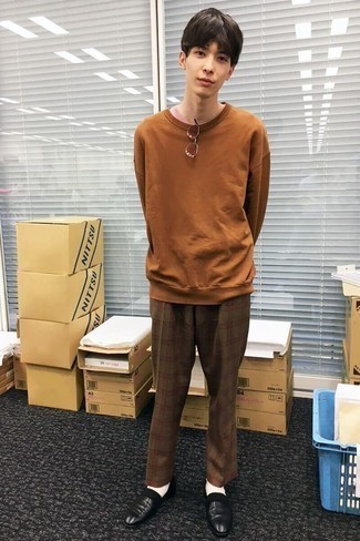 Brown Sweatshirt Outfits For Men: This laid-back combo of a brown sweatshirt and brown plaid chinos is extremely easy to throw together without a second thought, helping you look awesome and prepared for anything without spending a ton of time searching through your wardrobe. Complete this ensemble with a pair of black leather loafers for a modern hi-low mix.