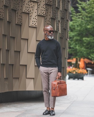 Charcoal Sweatshirt Outfits For Men: A charcoal sweatshirt and brown chinos are a cool getup to carry you throughout the day and into the night. Complete this ensemble with black leather loafers to switch things up.