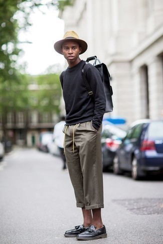 Charcoal Sweatshirt Outfits For Men: This combo of a charcoal sweatshirt and grey chinos embodies laid-back attitude and comfortable menswear style. You could perhaps get a bit experimental with shoes and complete this ensemble with black leather tassel loafers.