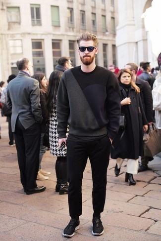 Charcoal Sweatshirt Outfits For Men: You'll be surprised at how extremely easy it is for any guy to get dressed like this. Just a charcoal sweatshirt worn with black chinos. When it comes to shoes, go for something on the casual end of the spectrum by slipping into black and white athletic shoes.