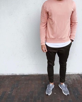 Pink Sweatshirt Outfits For Men: If the setting permits a laid-back outfit, wear a pink sweatshirt and black chinos. Bring an easy-going feel to this outfit by wearing grey athletic shoes.