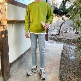 Light Blue Jeans Outfits For Men: Teaming a green-yellow sweatshirt with light blue jeans is an amazing option for a casual yet seriously stylish outfit. Silver athletic shoes will add a more relaxed touch to an otherwise traditional outfit.