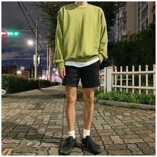 Green-Yellow Sweatshirt Outfits For Men: Pairing a green-yellow sweatshirt with black shorts is a comfortable option. Why not take a more relaxed approach with footwear and introduce a pair of black athletic shoes to the mix?
