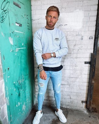 Men's Grey Print Sweatshirt, Black Crew-neck T-shirt, Light Blue Ripped Skinny Jeans, White and Black Leather Low Top Sneakers