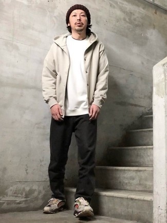 Beige Hoodie Outfits For Men: A beige hoodie and black jeans are wonderful menswear staples that will integrate nicely within your current off-duty arsenal. Complete this ensemble with a pair of beige athletic shoes to avoid looking overdressed.