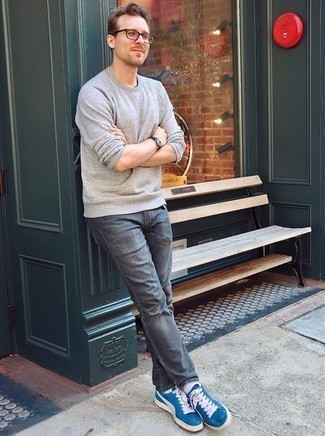 Charcoal Sweatshirt Outfits For Men: A charcoal sweatshirt and grey jeans paired together are a sartorial dream for those who prefer casually dapper outfits. For maximum fashion effect, enter a pair of blue suede low top sneakers into the equation.