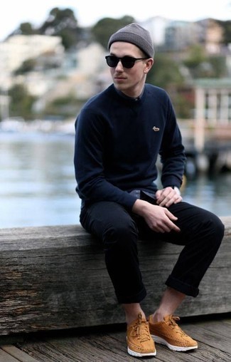 Blue Sweatshirt Outfits For Men: Indisputable proof that a blue sweatshirt and black chinos look amazing when worn together in a laid-back ensemble. And if you want to immediately play down your getup with a pair of shoes, why not add a pair of tobacco athletic shoes?
