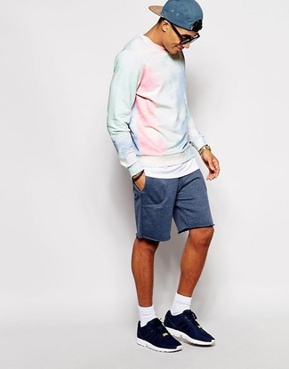 Light Blue Acid Wash Sweatshirt Outfits For Men: This pairing of a light blue acid wash sweatshirt and navy shorts is proof that a pared down casual outfit doesn't have to be boring. Hesitant about how to finish off? Go for a pair of navy athletic shoes for a more relaxed touch.