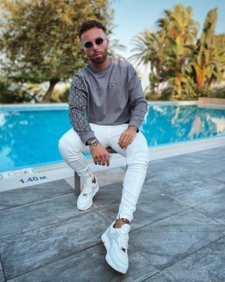 White Skinny Jeans Outfits For Men: For a casual look, opt for a grey print sweatshirt and white skinny jeans — these two items play nicely together. A trendy pair of white athletic shoes is an easy way to upgrade this outfit.