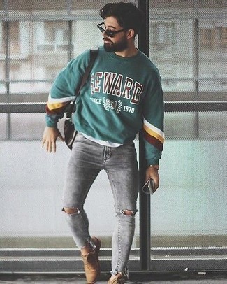 Olive Print Sweatshirt Outfits For Men: If you love edgy combos, then you'll love this combo of an olive print sweatshirt and grey ripped skinny jeans. Not sure how to finish your getup? Finish with a pair of tan suede derby shoes to ramp it up.