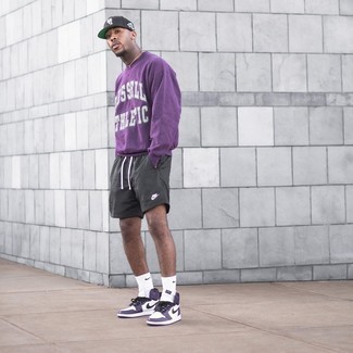 Purple Print Sweatshirt Outfits For Men: A purple print sweatshirt and charcoal sports shorts are great menswear elements to add to your off-duty routine. A pair of violet leather high top sneakers is the glue that will bring this look together.