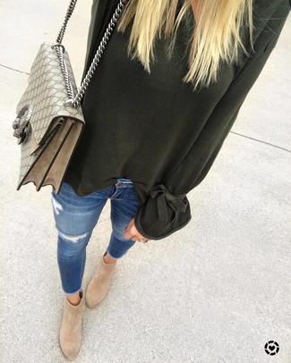 Women's Beige Print Canvas Satchel Bag, Tan Suede Ankle Boots, Blue Ripped Skinny Jeans, Dark Green Oversized Sweater