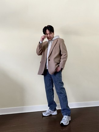 Tan Blazer with Hoodie Outfits For Men: One of the coolest ways for a man to style a tan blazer is to team it with a hoodie in a relaxed getup. Serve a little outfit-mixing magic with a pair of white athletic shoes.