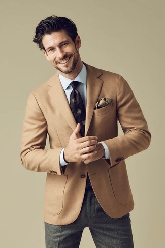 Tan Wool Blazer Outfits For Men: This sophisticated combo of a tan wool blazer and charcoal wool dress pants is a popular choice among the dapper men.