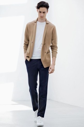 Beige Knit Blazer Outfits For Men: This combo of a beige knit blazer and navy chinos can only be described as seriously stylish and casually neat. Not sure how to round off? Add white leather low top sneakers to this outfit for a more relaxed finish.