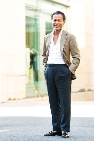 Blue Dress Pants with Loafers Warm Weather Outfits For Men: Loving the way this pairing of a tan blazer and blue dress pants instantly makes you look polished and stylish. Let your outfit coordination chops truly shine by rounding off your ensemble with loafers.
