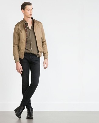 Tan Bomber Jacket Outfits For Men: A tan bomber jacket and charcoal skinny jeans make for the ultimate casual style for today's guy. Balance this look with a more sophisticated kind of shoes, such as this pair of black leather chelsea boots.