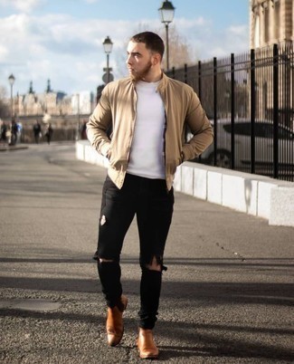 Brown Leather Chelsea Boots Outfits For Men: This off-duty combo of a tan bomber jacket and black ripped skinny jeans is a foolproof option when you need to look stylish in a flash. And if you want to effortlessly polish off your outfit with one single piece, why not introduce brown leather chelsea boots to this ensemble?