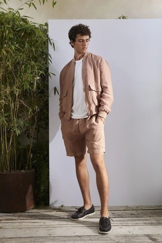 Tan Bomber Jacket Outfits For Men: Why not try pairing a tan bomber jacket with tan shorts? As well as totally comfortable, these items look amazing when paired together. When not sure about what to wear when it comes to shoes, add a pair of black leather boat shoes to the mix.