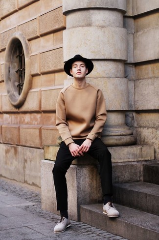 Black Hat Outfits For Men: This off-duty combo of a tan crew-neck sweater and a black hat comes in useful when you need to look stylish in a flash. Grey suede derby shoes will bring an extra dose of elegance to an otherwise mostly dressed-down ensemble.