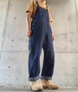 Navy Denim Overalls Outfits For Men: This casual combo of a tan crew-neck t-shirt and navy denim overalls is effortless, on-trend and very easy to imitate. Level up your ensemble with the help of a pair of beige suede chelsea boots.