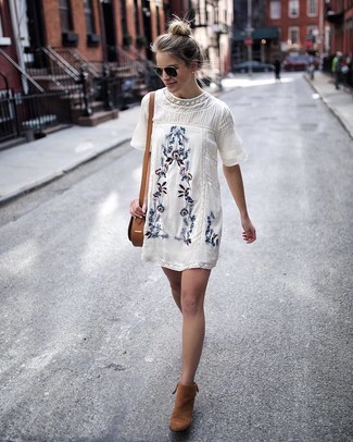Women's Black Sunglasses, Tan Leather Crossbody Bag, Tobacco Suede Ankle Boots, White Embroidered Shift Dress