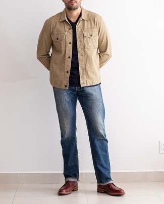 Navy Crew-neck T-shirt Outfits For Men: This is irrefutable proof that a navy crew-neck t-shirt and navy jeans are awesome when paired together in a laid-back look. Go ahead and introduce burgundy leather derby shoes to the mix for an extra touch of class.