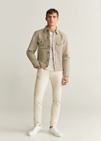 Beige Denim Jacket Outfits For Men: This pairing of a beige denim jacket and beige chinos is pulled together and yet it's casual enough and apt for anything. A pair of white leather low top sneakers will bring a laid-back touch to this look.