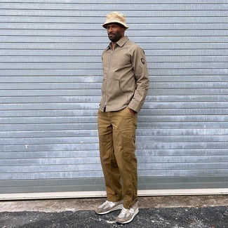Tan Harrington Jacket Outfits: A tan harrington jacket and khaki cargo pants are a pairing that every sharp gent should have in his wardrobe. Complement this ensemble with a pair of tan athletic shoes to avoid looking too polished.