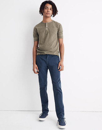 Tan Henley Shirt Outfits For Men: This combination of a tan henley shirt and navy chinos is super stylish and provides instant off-duty cool. When in doubt about the footwear, introduce navy canvas low top sneakers to the equation.