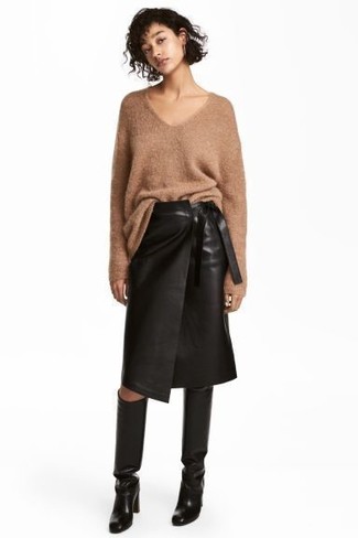 Tan Knit Oversized Sweater Outfits: If you don't take fashion too seriously, go for laid-back and cool style in a tan knit oversized sweater and a black leather pencil skirt. For something more on the sophisticated end to finish your outfit, complement this look with a pair of black leather knee high boots.