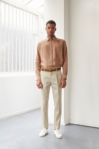 Dark Brown Suede Belt Outfits For Men: For a modern casual outfit, Make a tan long sleeve shirt and a dark brown suede belt your outfit choice. A good pair of white canvas low top sneakers is an effortless way to infuse a dash of sophistication into your ensemble.