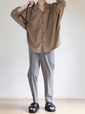 Sandals Outfits For Men: This casual pairing of a tan long sleeve shirt and grey chinos is perfect if you want to feel confident in your look. Complement your ensemble with a pair of sandals to instantly turn up the appeal of this look.