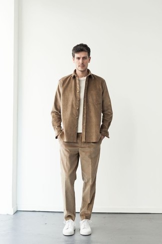 Tan Wool Long Sleeve Shirt Outfits For Men: A tan wool long sleeve shirt and khaki dress pants are absolute must-haves if you're figuring out a sharp closet that holds to the highest sartorial standards. To add a more casual touch to your outfit, complete your look with white canvas low top sneakers.