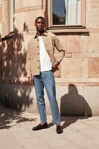 Dark Brown Leather Loafers Outfits For Men: A tan corduroy long sleeve shirt and light blue jeans are stylish menswear items, without which no closet would be complete. Complement this outfit with dark brown leather loafers for an added touch of elegance.